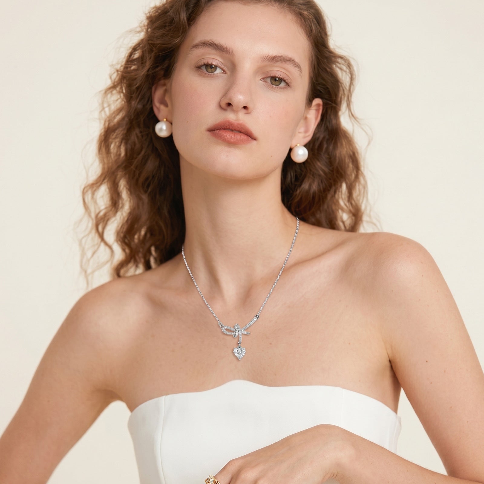 Pavé CZ Ribbon Knot Heart Cut Drop Pendant Necklace | Silver Plated Brass | Wholesale OEM