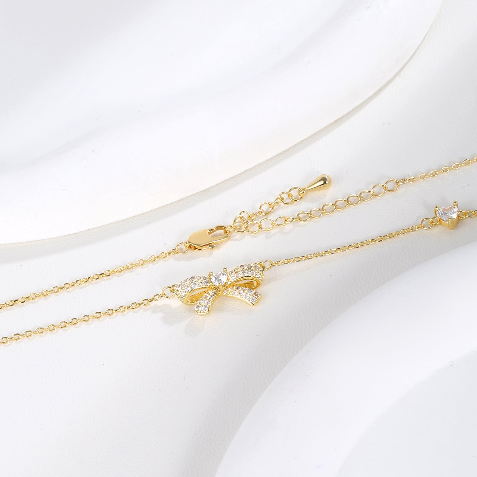 Pavé Clear CZ Bow Pendant Dainty Chain Necklace | 18K Gold Plated Brass | Wholesale OEM