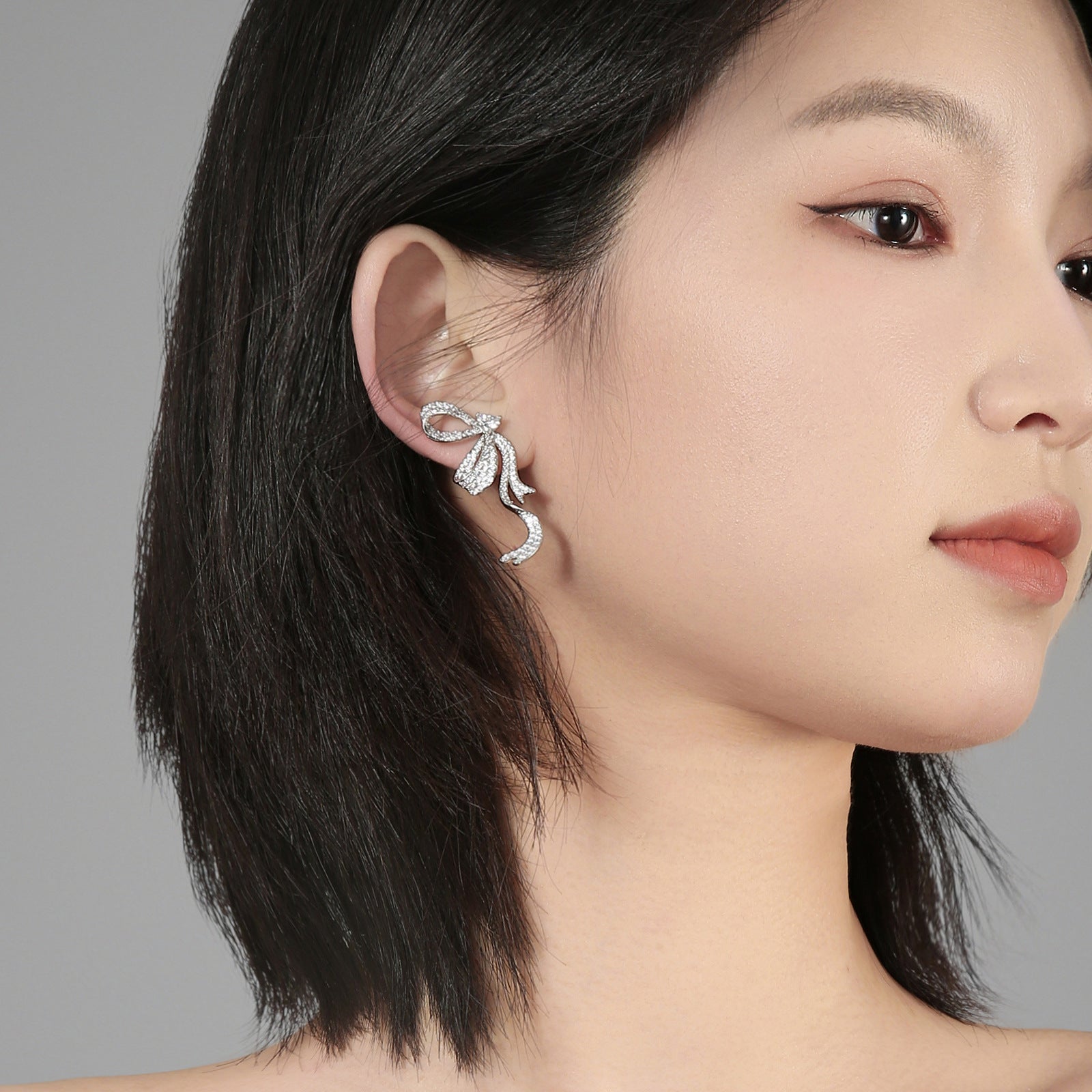 Full Pavé CZ Flowing Bow Drop Earrings | Silver Plated Brass | Wholesale OEM