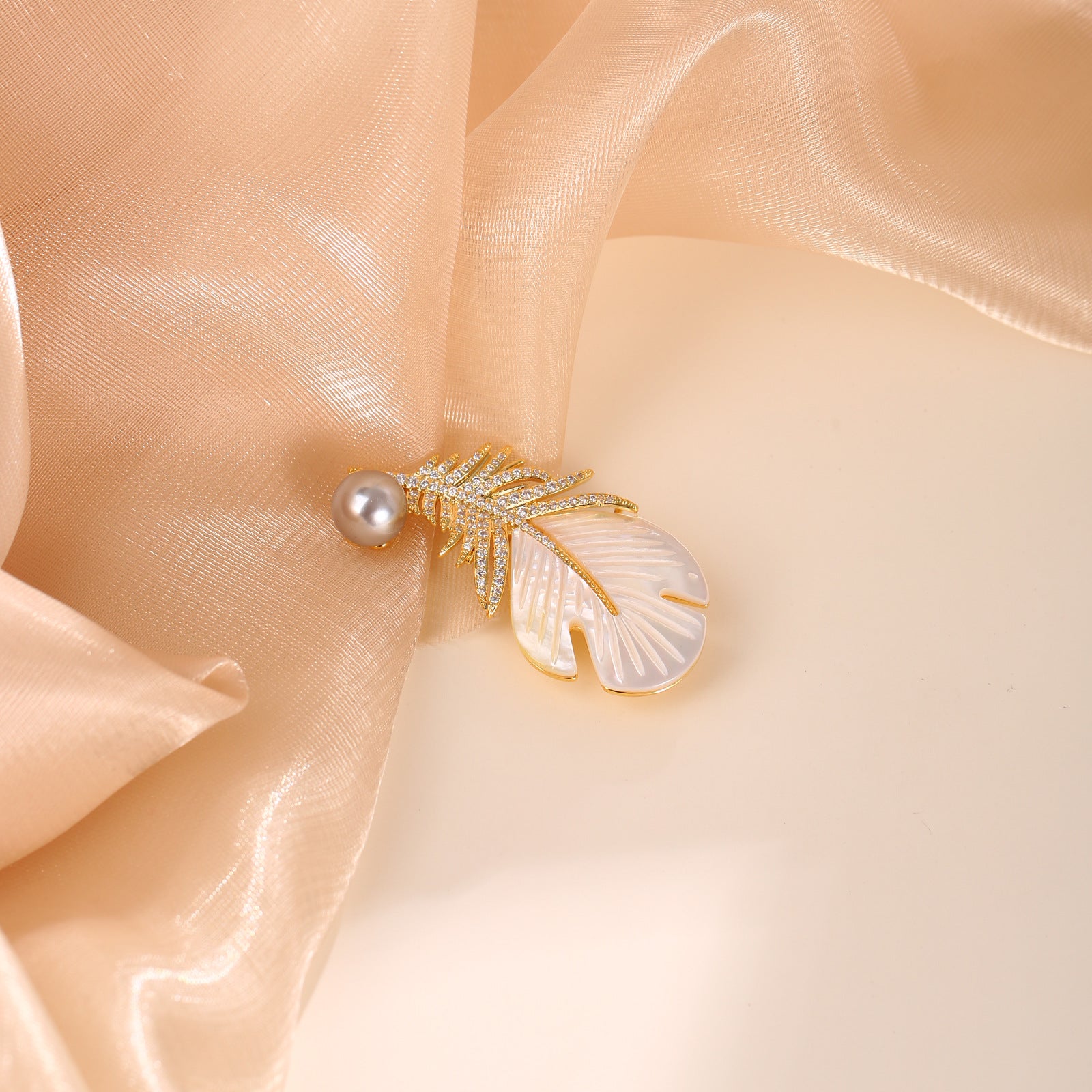 Carved Mother of Pearl Feather Brooch with Pavé CZ & Grey Pearl | 18K Gold Plated Brass | Wholesale OEM