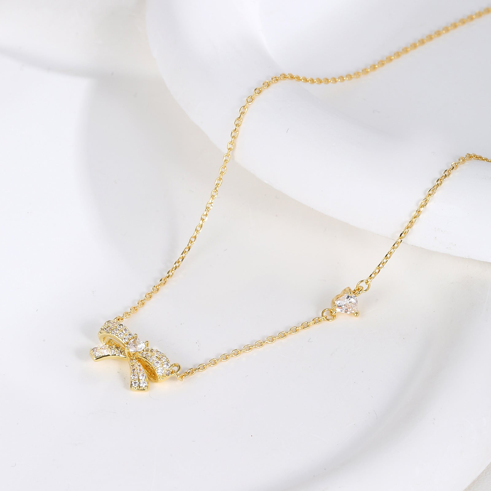 Pavé Clear CZ Bow Pendant Dainty Chain Necklace | 18K Gold Plated Brass | Wholesale OEM