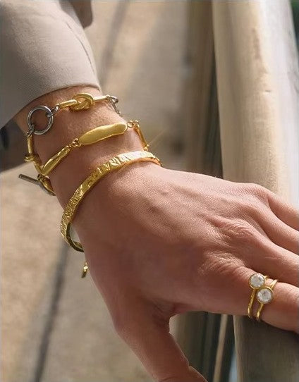 KAVNAR gold bracelets and bangles
